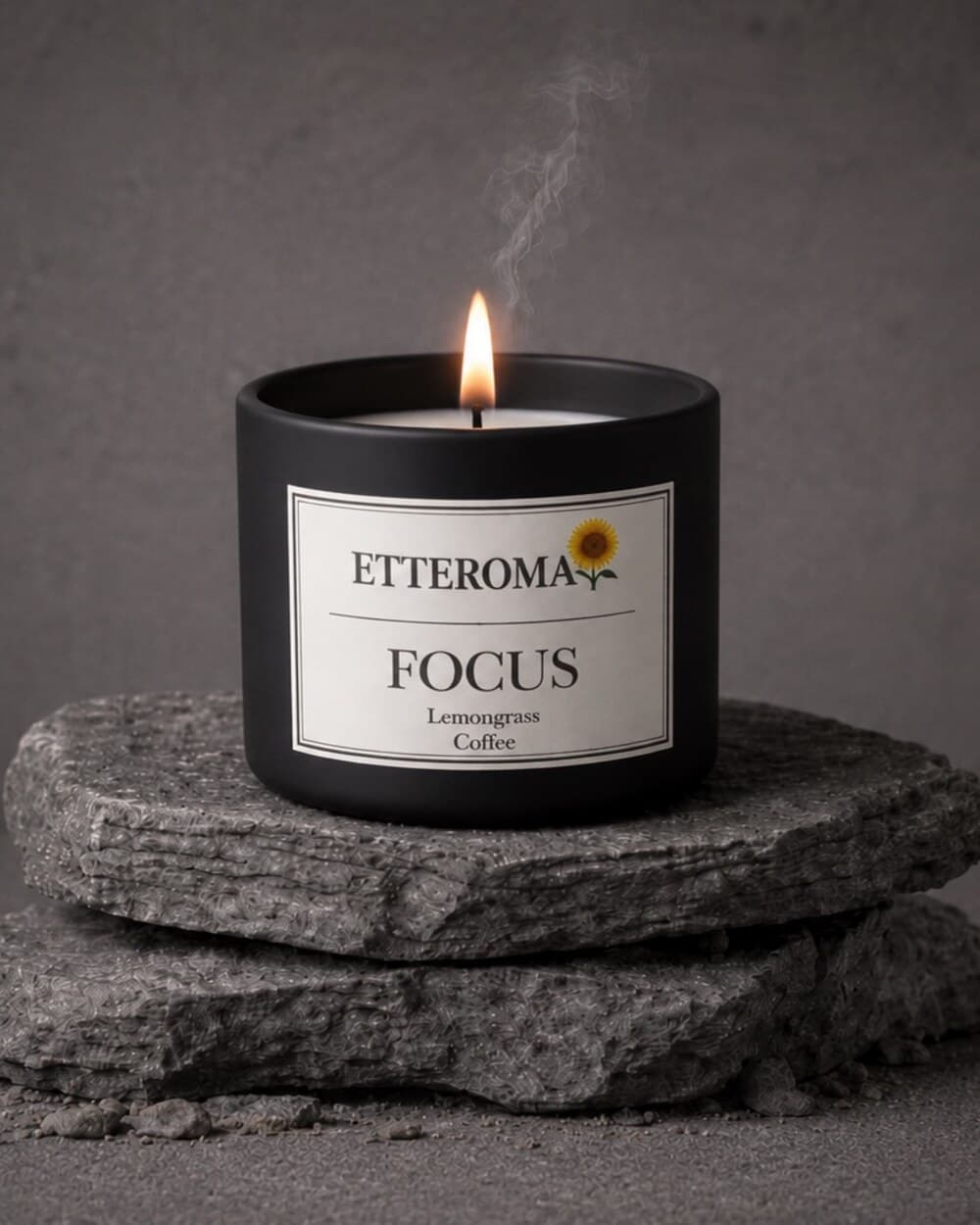 The Focus candle on stacked slate