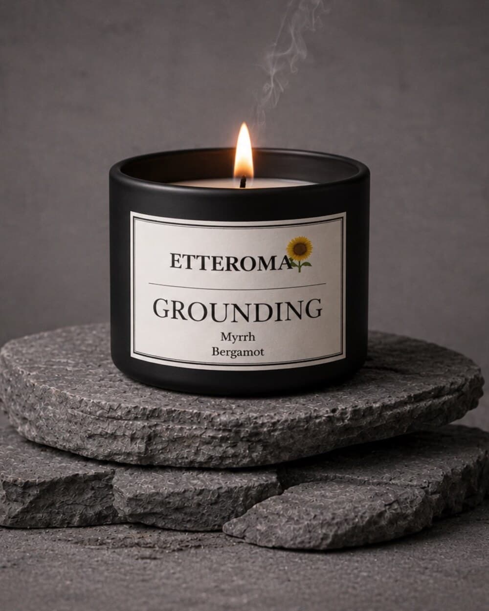The Grounding candle on stacked slate